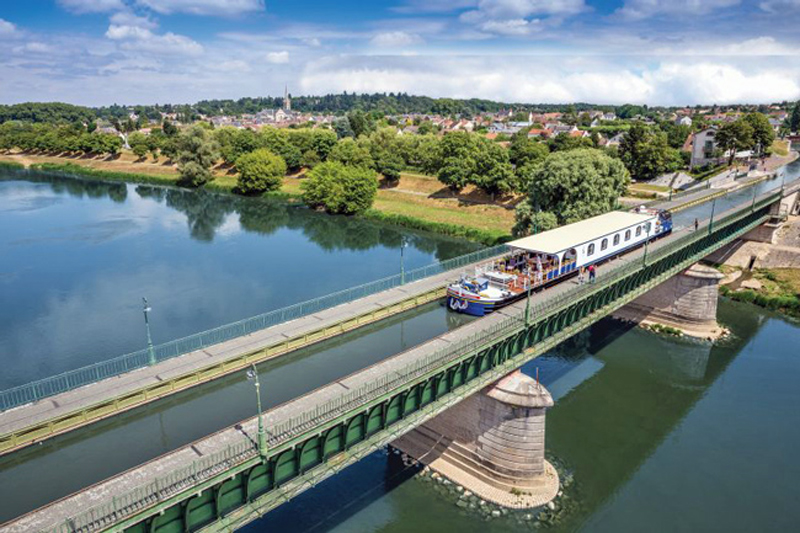 Barging in France - Renaissance traversing the Pont Canal de Briare - Canal de Briare, France - BargeCharters.com
