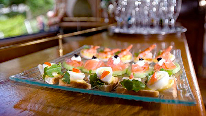 Enjoy a canape aboard French Hotel Barge L'Impressionniste