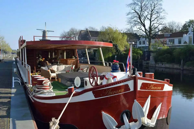 Hotel Barge Aurora moored alongside the quai