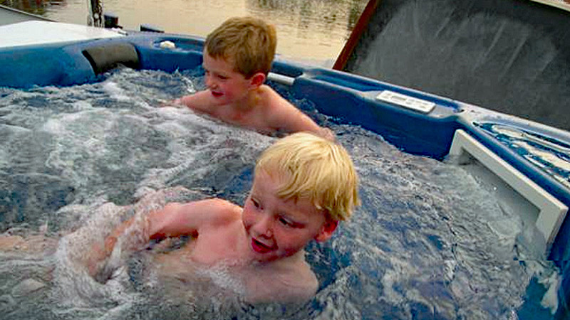 English Hotel Barge Magna Carta - Kids enjoying the hot tub
