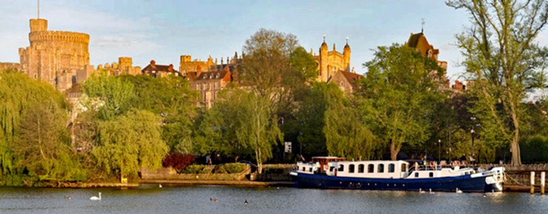 English Hotel Barge Magna Carta moored outside of Windsor