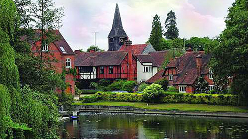 Scenic village on the Thames. Barging in England