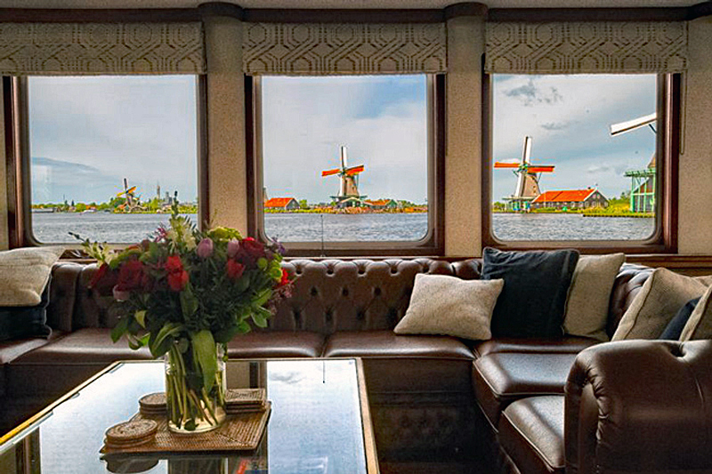 Hotel Barge Panache - Panoramic windows with windmills in the background