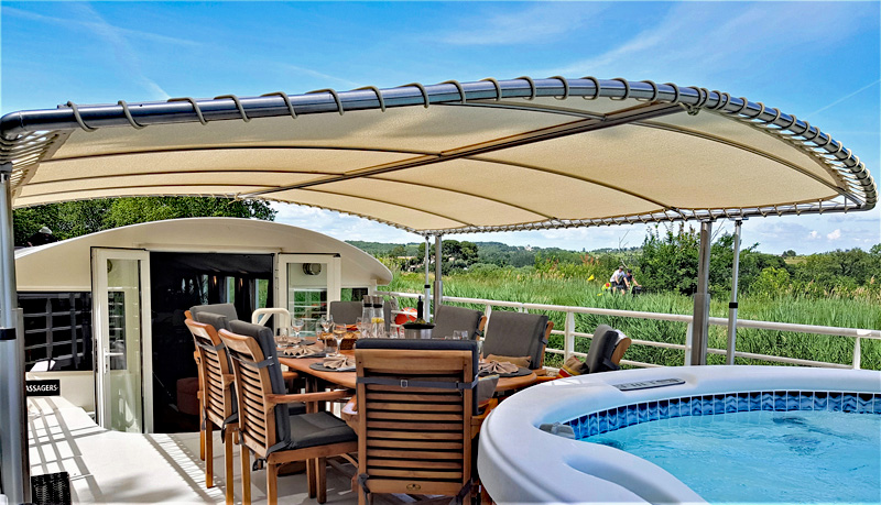 French Hotel Barge Enchante - New awning provides shade over part of the forward sundeck.