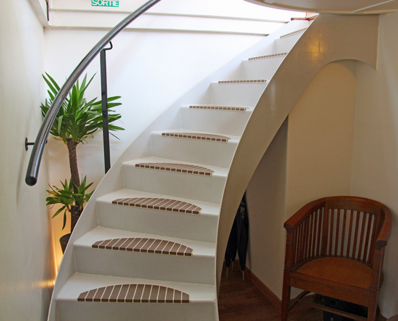 French Hotel Barge Enchante - Stairway with 11 steps from salon on main deck to lower deck with the guest cabins