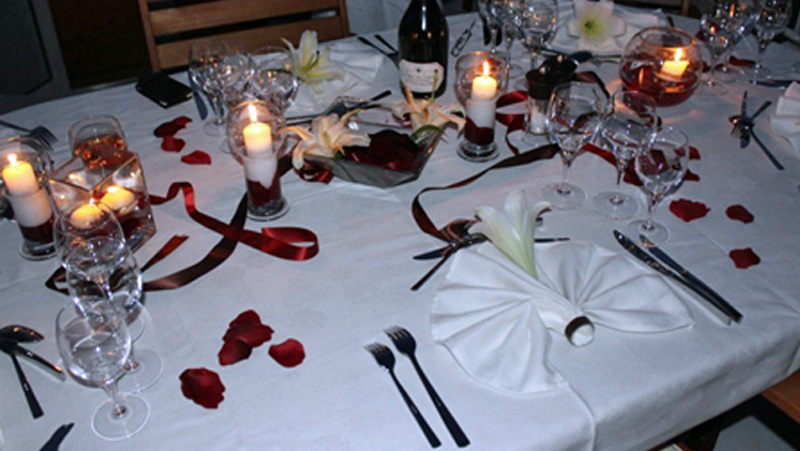 French Hotel Barge Enchante - Dining table set for a candlelight evening meal
