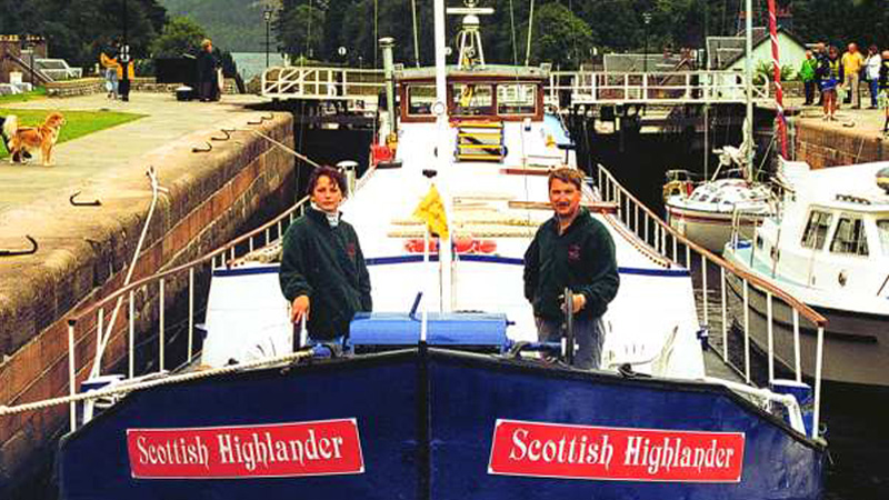 Scottish Hotel Barge Scottish Highlander in the Fort Augustus lock in the Highlands of Scotland
