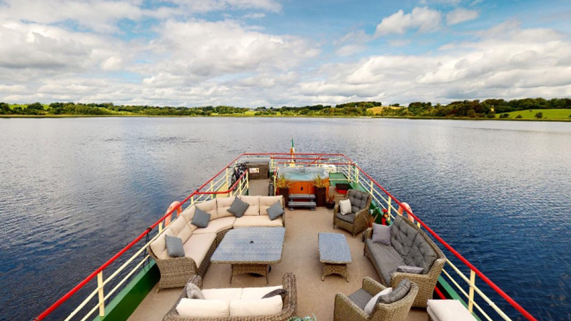 Irish Hotel Barge Shannon Princess - The sundeck is an excellent place to watch the scenery pass by and socialize. It has sofas, armchairs, tables, and a hot tub (spa pool)