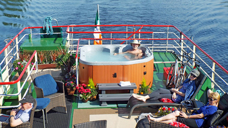 Irish Hotel Barge Shannon Princess - Relax on the upper sundeck in the hot tub (spa pool) or sunloungers & chairs