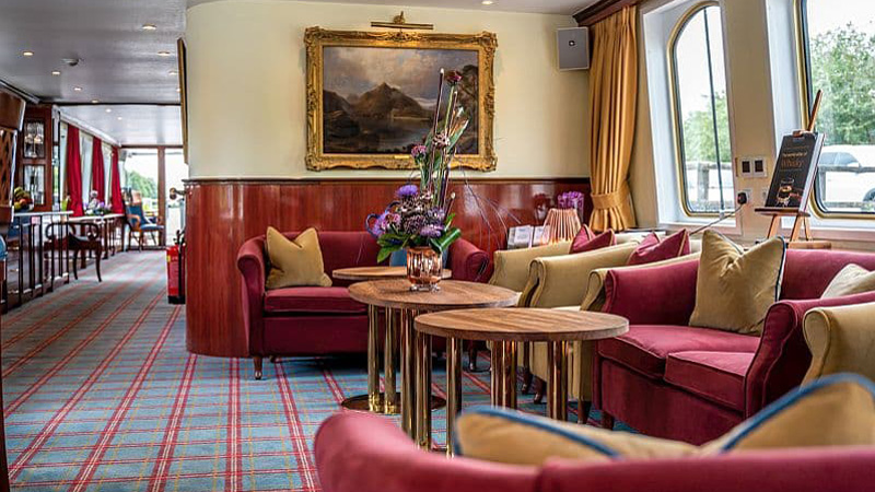 Scottish Hotel Barge Spirit of Scotland - Comfortable salon with sofas, armchairs, and coffee tables